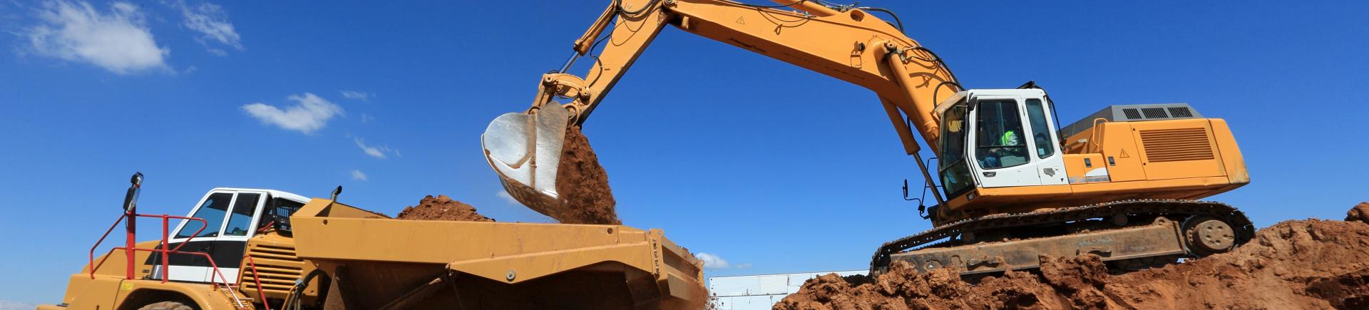 Bulldozer et camion benne